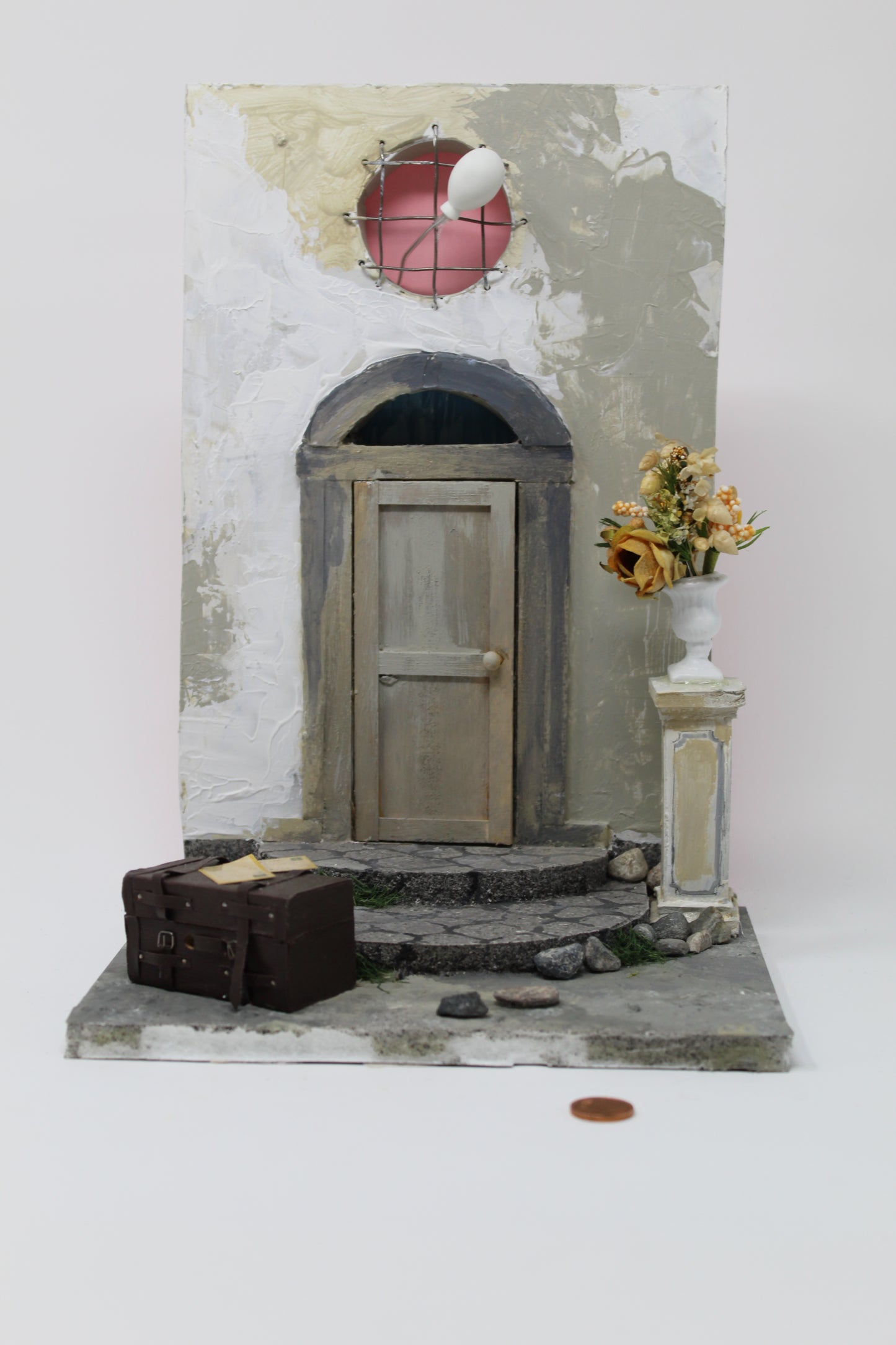Porta e fatina con vaso