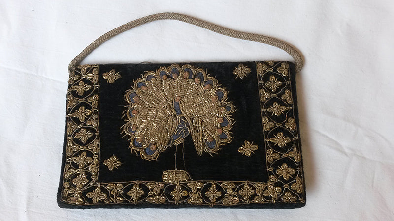 Pochette irachena con manico - NONèdabuttare