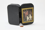 scatola nera con tre gatti nel quadro